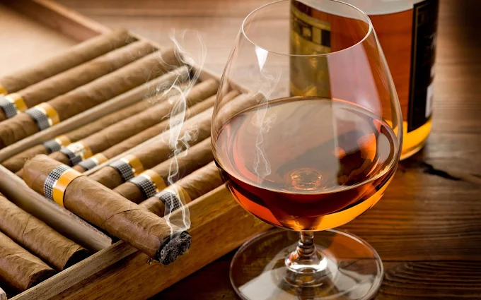 Premium cigars and a glass of cognac